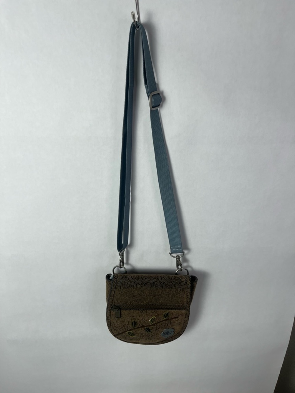 Haiku Blue-Strap Brown Crossbody Bag with Leaf Accent
